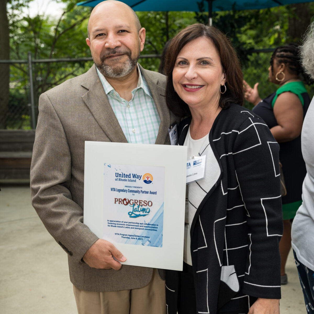 Mario Bueno, executive director of Progreso Latino, poses with Natalia Lima, vice president/community development market manager at Citizens.