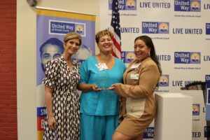 United Way of Rhode Island President and CEO Cortney Nicolato posing with Lifespan's Christin Zollicoffer and Vanessa Vigil.