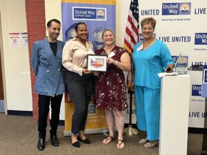 United Way of Rhode Island's Kevin Matta and Lifespan's Christin Zollicoffer with two Housing Network of Rhode Island staff.