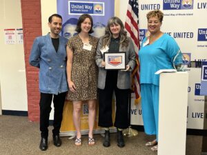 United Way of Rhode Island's Kevin Matta and Lifespan's Christin Zollicoffer with Oomph, Inc.'s Jana Aubin and Hanna Furey.